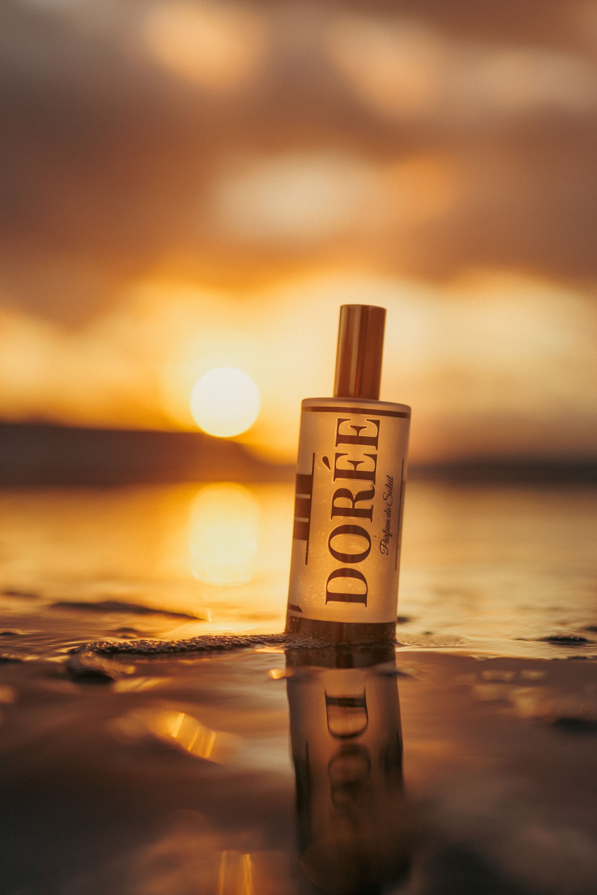 Dorée premium sunscreen at golden hour