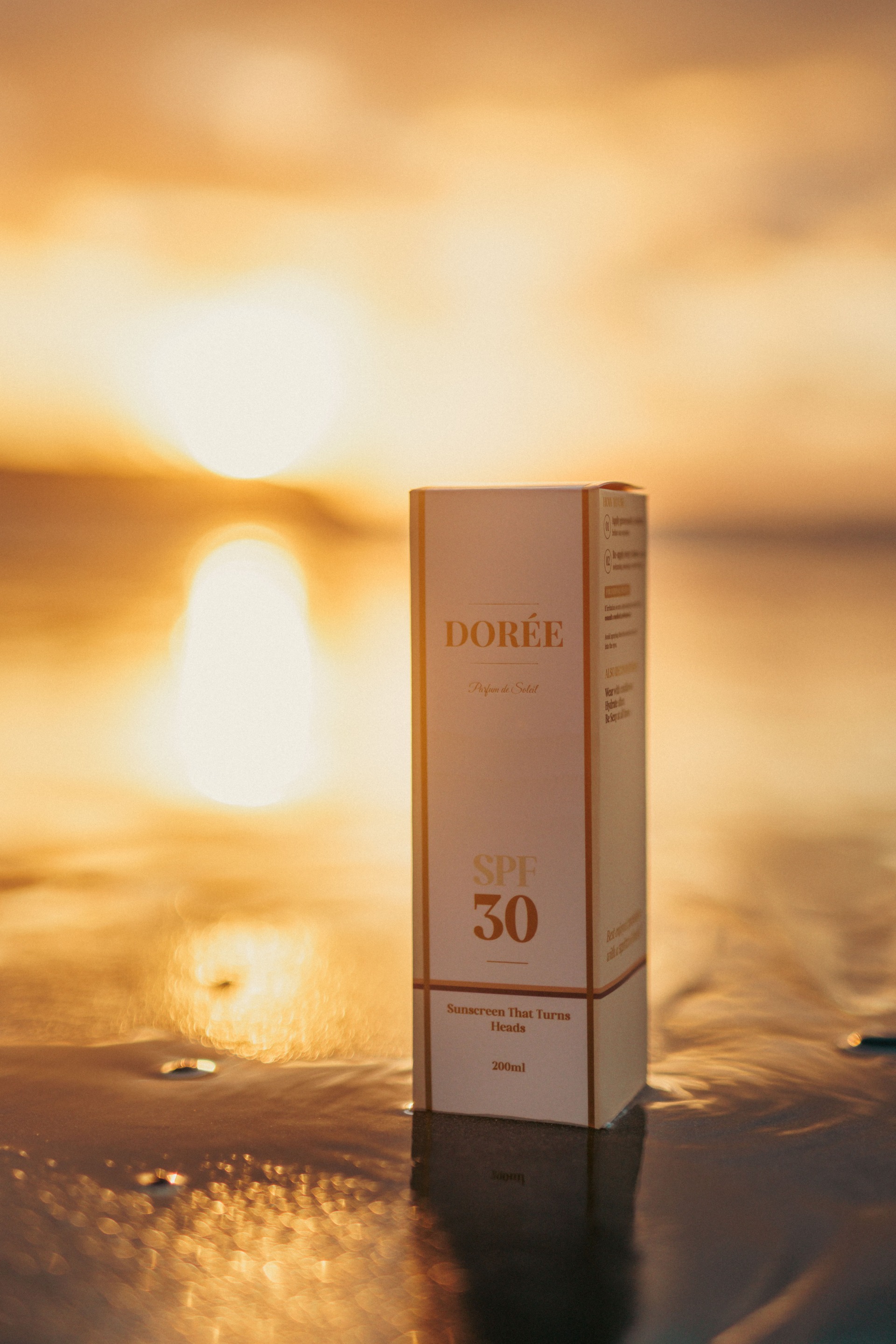 Dorée packaging at sunset on water